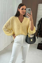 Fluffy V-neck blouse with floral patterns