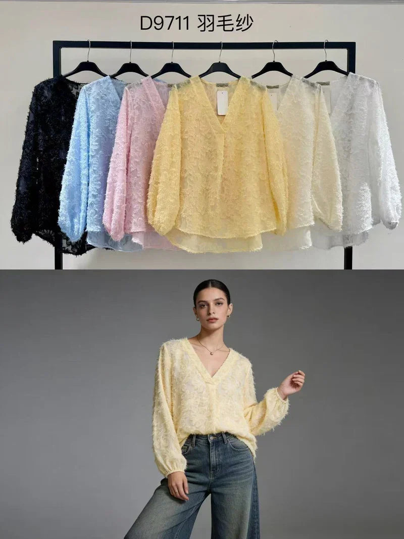 Fluffy V-neck blouse with floral patterns