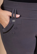 Leggings with buttons on the pockets