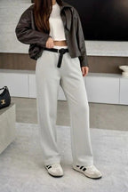 Oversized pants with belt and white stripe